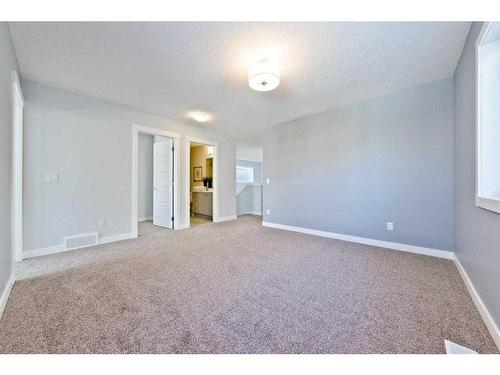 27 Versant View Sw, Calgary, AB - Indoor Photo Showing Other Room