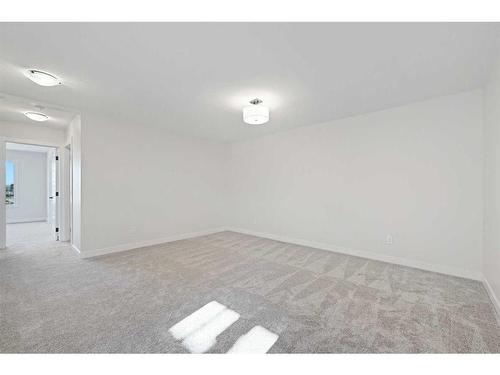 27 Versant View Sw, Calgary, AB - Indoor Photo Showing Other Room