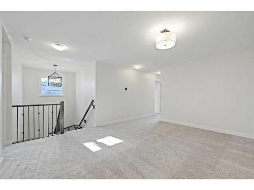 27 Versant View Sw, Calgary, AB - Indoor Photo Showing Other Room