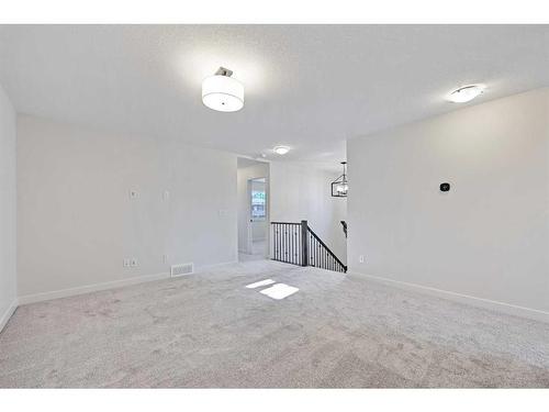 27 Versant View Sw, Calgary, AB - Indoor Photo Showing Other Room