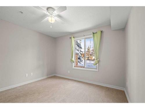 3103-92 Crystal Shores Road, Okotoks, AB - Indoor Photo Showing Other Room