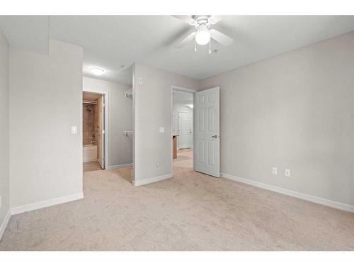 3103-92 Crystal Shores Road, Okotoks, AB - Indoor Photo Showing Other Room