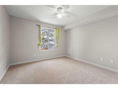 3103-92 Crystal Shores Road, Okotoks, AB - Indoor Photo Showing Other Room