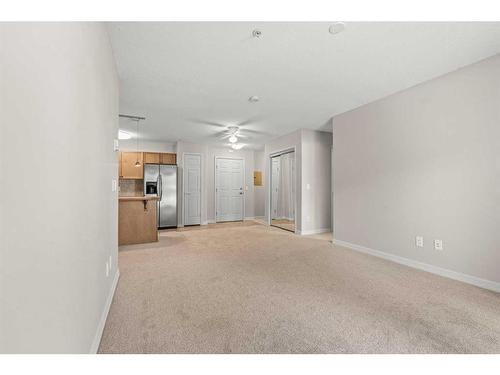 3103-92 Crystal Shores Road, Okotoks, AB - Indoor Photo Showing Other Room