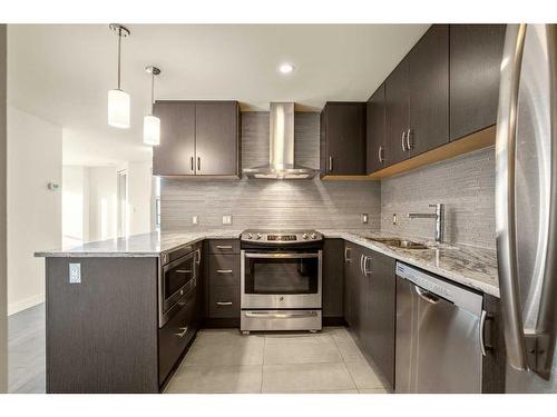 610-303 13 Avenue Sw, Calgary, AB - Indoor Photo Showing Kitchen With Stainless Steel Kitchen With Upgraded Kitchen