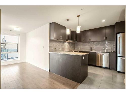 610-303 13 Avenue Sw, Calgary, AB - Indoor Photo Showing Kitchen With Stainless Steel Kitchen With Upgraded Kitchen