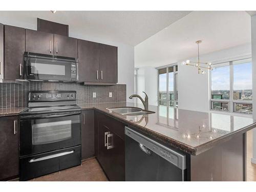 1810-210 15 Avenue Se, Calgary, AB - Indoor Photo Showing Kitchen With Double Sink With Upgraded Kitchen