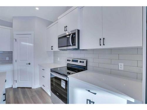 1139 Chinook Winds Circle Sw, Airdrie, AB - Indoor Photo Showing Kitchen