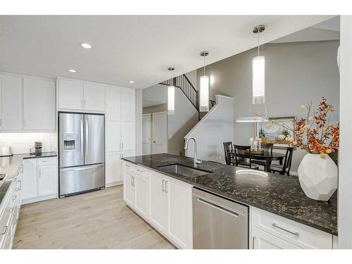 51 Quarry Common Se, Calgary, AB - Indoor Photo Showing Kitchen With Upgraded Kitchen