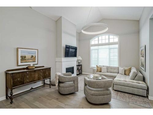 51 Quarry Common Se, Calgary, AB - Indoor Photo Showing Living Room With Fireplace