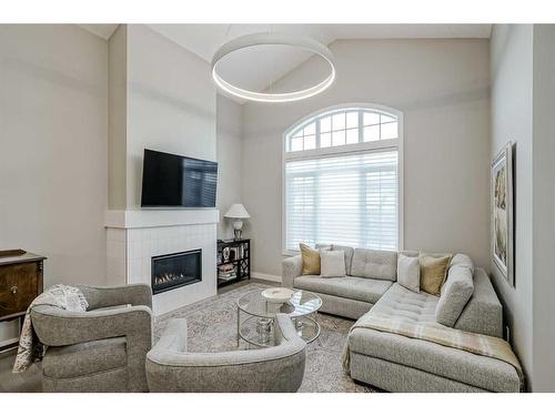 51 Quarry Common Se, Calgary, AB - Indoor Photo Showing Living Room With Fireplace