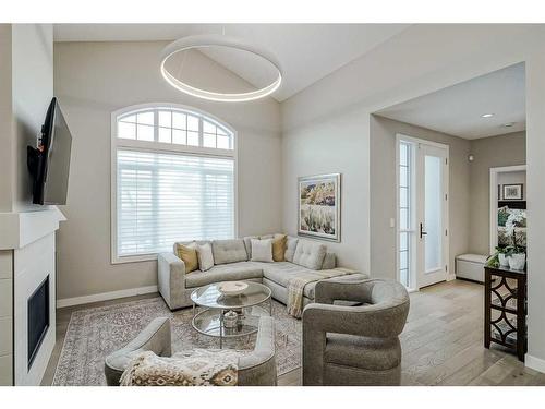 51 Quarry Common Se, Calgary, AB - Indoor Photo Showing Living Room With Fireplace