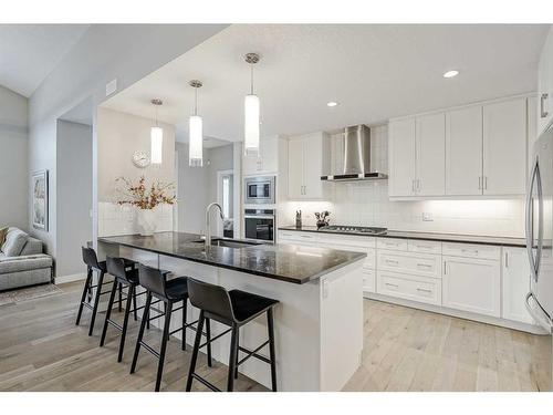 51 Quarry Common Se, Calgary, AB - Indoor Photo Showing Kitchen With Upgraded Kitchen