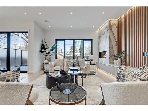 448 25 Avenue Ne, Calgary, AB - Indoor Photo Showing Living Room With Fireplace