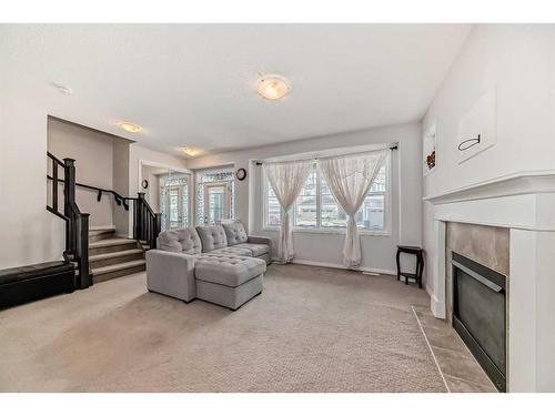 118 Cityscape Terrace Ne, Calgary, AB - Indoor Photo Showing Living Room With Fireplace