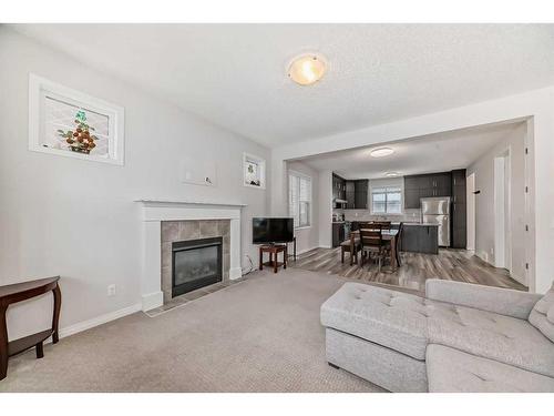 118 Cityscape Terrace Ne, Calgary, AB - Indoor Photo Showing Living Room With Fireplace