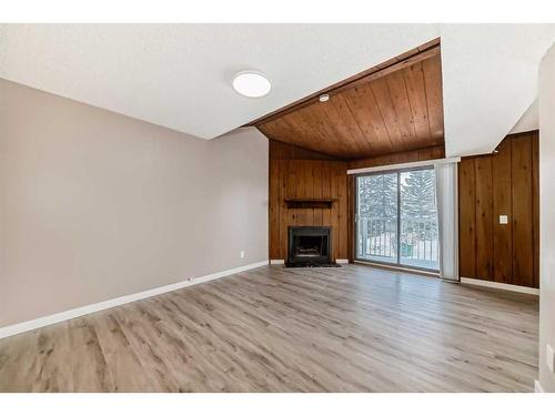 2004-3500 Varsity Drive Nw, Calgary, AB - Indoor Photo Showing Living Room With Fireplace