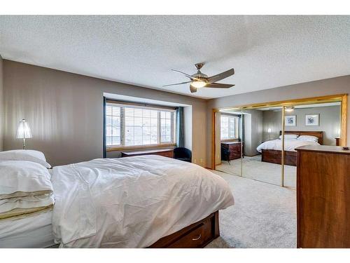 107 Hawkmount Close Nw, Calgary, AB - Indoor Photo Showing Bedroom