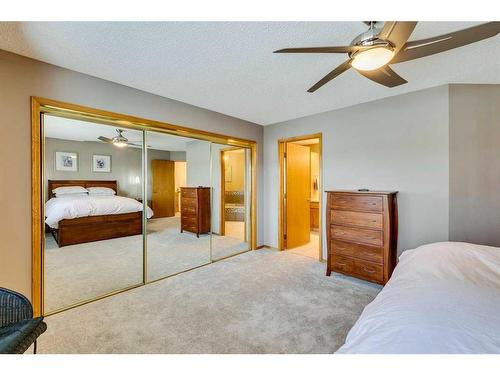 107 Hawkmount Close Nw, Calgary, AB - Indoor Photo Showing Bedroom