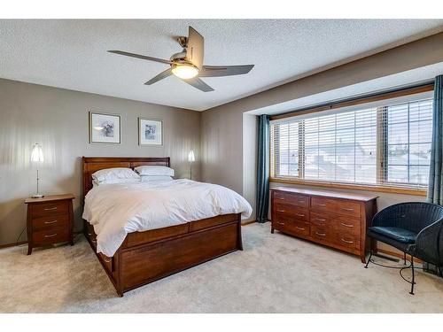 107 Hawkmount Close Nw, Calgary, AB - Indoor Photo Showing Bedroom