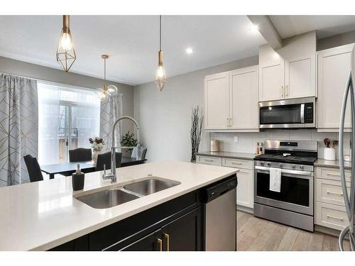 133 Marina Key, Chestermere, AB - Indoor Photo Showing Kitchen With Double Sink