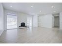 628 Maryvale Way Ne, Calgary, AB  - Indoor Photo Showing Living Room 