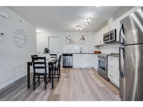 343 Cranbrook Square Se, Calgary, AB - Indoor Photo Showing Kitchen With Stainless Steel Kitchen