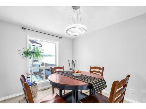 5-200 Hidden Hills Terrace Nw, Calgary, AB - Indoor Photo Showing Dining Room