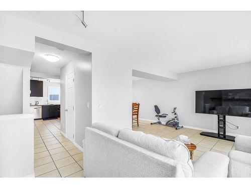 5-200 Hidden Hills Terrace Nw, Calgary, AB - Indoor Photo Showing Living Room