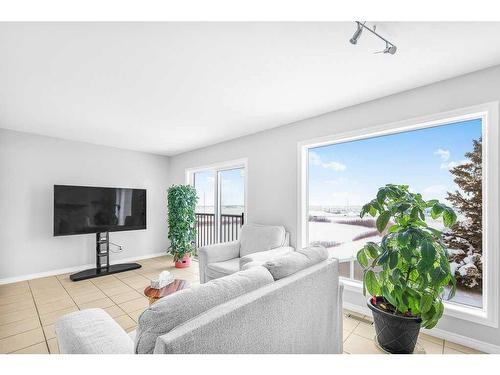 5-200 Hidden Hills Terrace Nw, Calgary, AB - Indoor Photo Showing Living Room