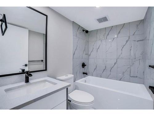 1304 Pennsburg Road Se, Calgary, AB - Indoor Photo Showing Bathroom