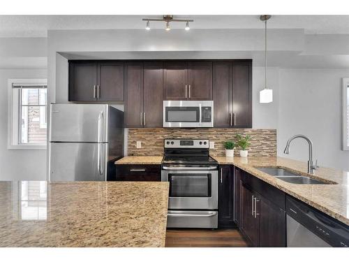 37 Redstone Circle Ne, Calgary, AB - Indoor Photo Showing Kitchen With Double Sink With Upgraded Kitchen