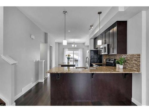 37 Redstone Circle Ne, Calgary, AB - Indoor Photo Showing Kitchen With Double Sink With Upgraded Kitchen