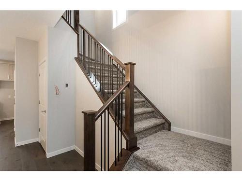 12 Emberside Grove, Cochrane, AB - Indoor Photo Showing Other Room