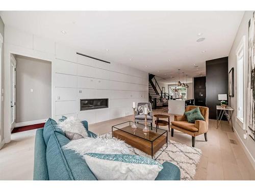 615 19 Avenue Nw, Calgary, AB - Indoor Photo Showing Living Room With Fireplace