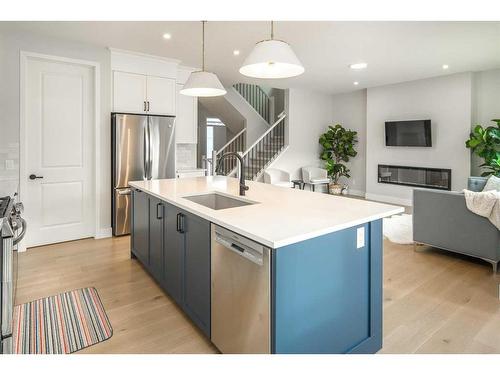 77 Belmont Villas Sw, Calgary, AB - Indoor Photo Showing Kitchen With Stainless Steel Kitchen With Upgraded Kitchen