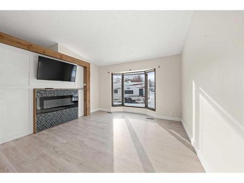 40 Bermondsey Road Nw, Calgary, AB - Indoor With Fireplace