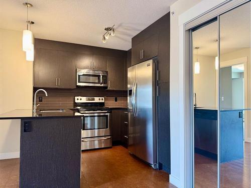 1411-240 Skyview Ranch Road Ne, Calgary, AB - Indoor Photo Showing Kitchen With Stainless Steel Kitchen With Upgraded Kitchen