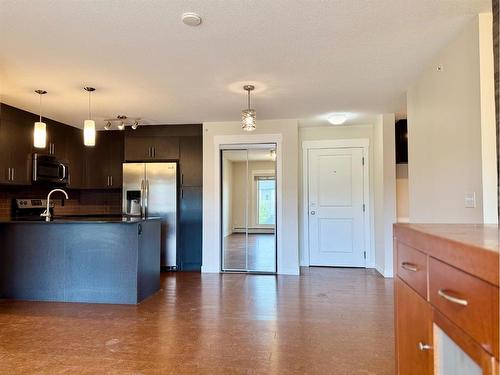 1411-240 Skyview Ranch Road Ne, Calgary, AB - Indoor Photo Showing Kitchen