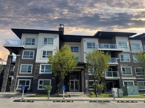 1411-240 Skyview Ranch Road Ne, Calgary, AB - Outdoor With Balcony With Facade