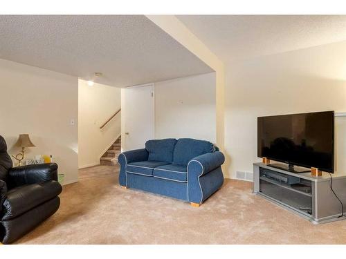 116 Sunvale Crescent Se, Calgary, AB - Indoor Photo Showing Living Room