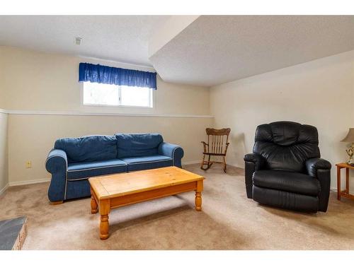 116 Sunvale Crescent Se, Calgary, AB - Indoor Photo Showing Living Room