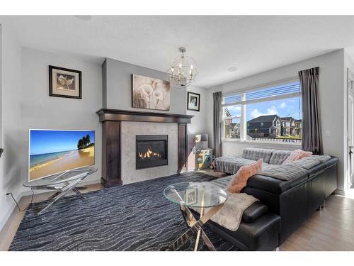 255 Savanna Lane Ne, Calgary, AB - Indoor Photo Showing Living Room With Fireplace