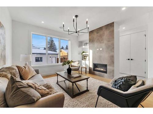 3535 40 Street Sw, Calgary, AB - Indoor Photo Showing Living Room With Fireplace