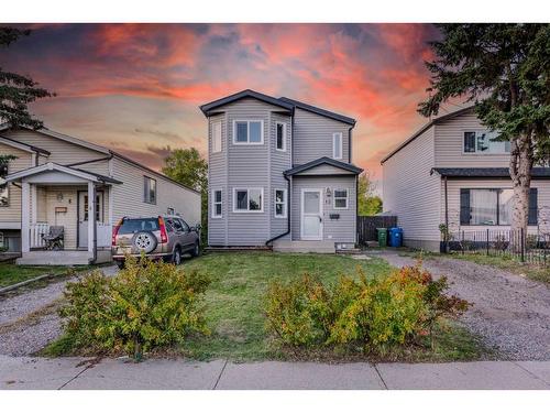 12 Abingdon Court Ne, Calgary, AB - Outdoor With Facade