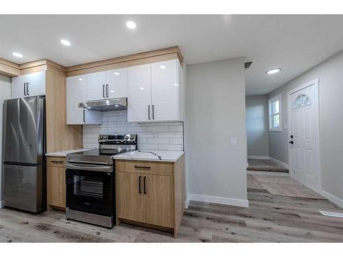 12 Abingdon Court Ne, Calgary, AB - Indoor Photo Showing Kitchen With Stainless Steel Kitchen