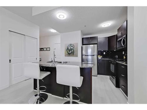 4306-5605 Henwood Street Sw, Calgary, AB - Indoor Photo Showing Kitchen With Stainless Steel Kitchen