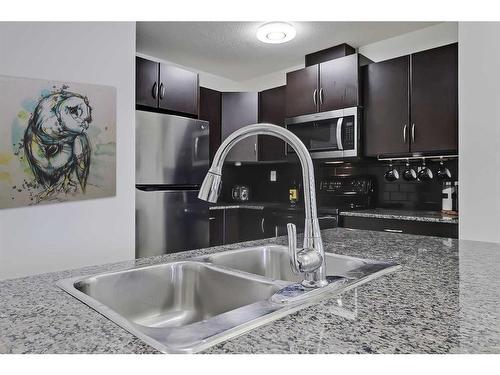 4306-5605 Henwood Street Sw, Calgary, AB - Indoor Photo Showing Kitchen With Double Sink