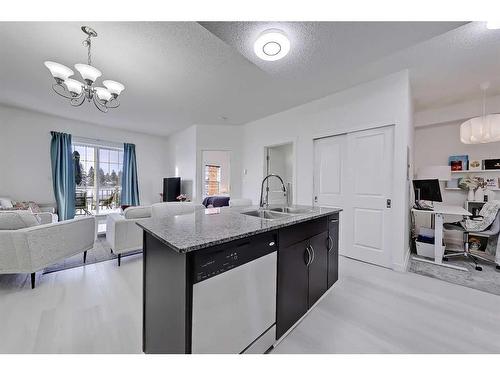 4306-5605 Henwood Street Sw, Calgary, AB - Indoor Photo Showing Kitchen With Double Sink