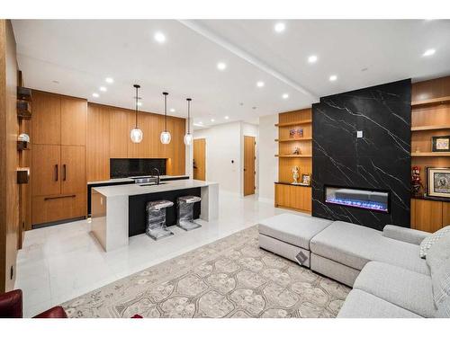 201,203,205-65 Edmonton Trail Ne, Calgary, AB - Indoor With Fireplace